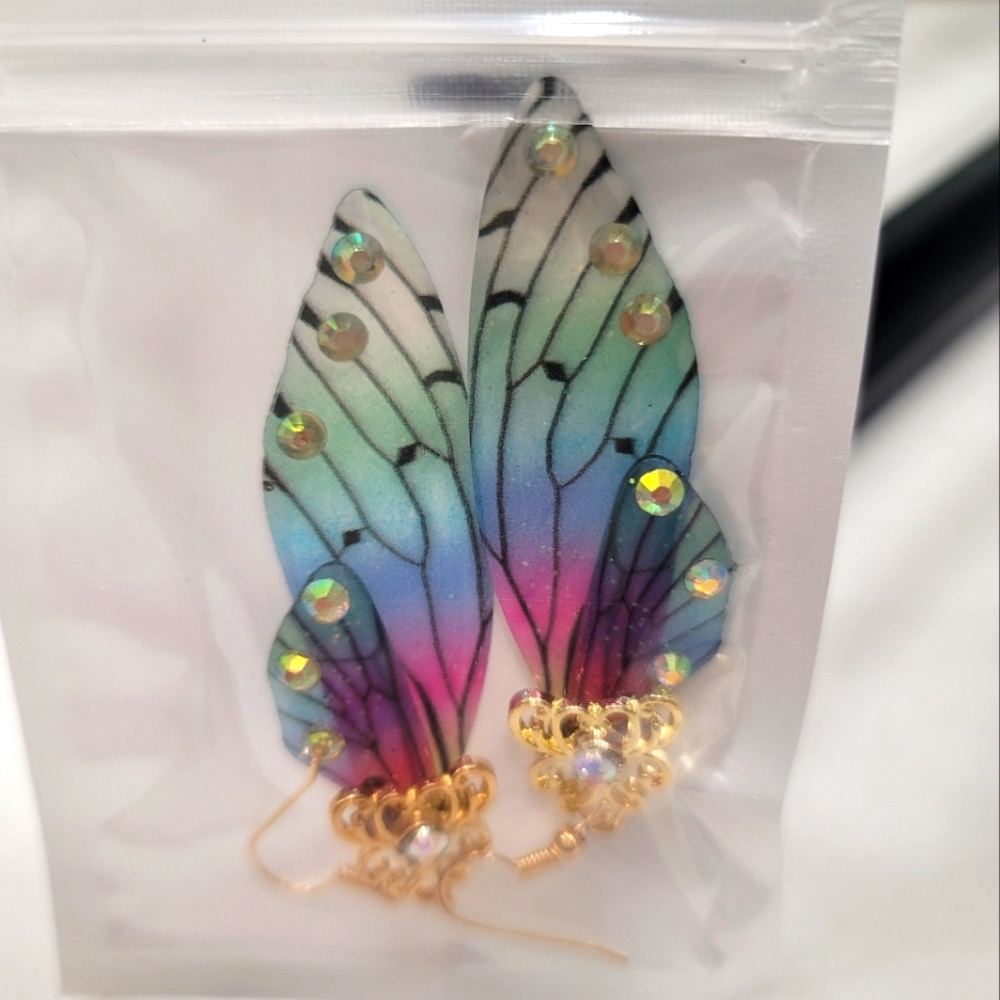New angel wing earrings. 2.5” long